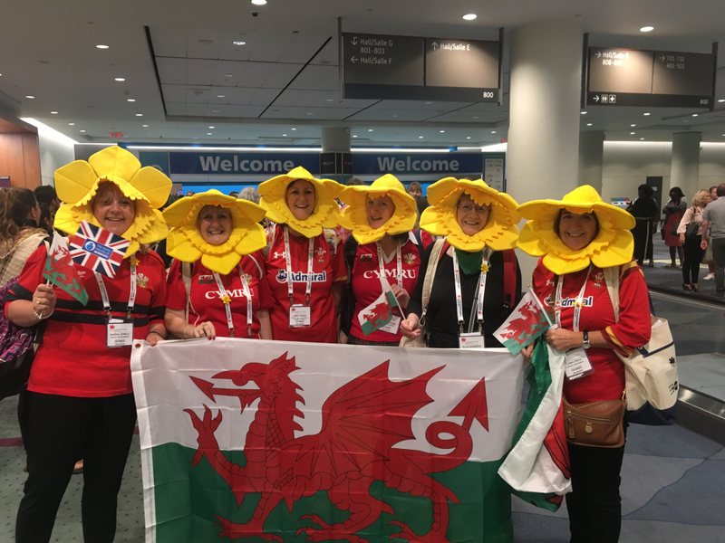 A group of Welsh midwives wear bonnets in the shape of Wales’s national flower, the daffodil, at the congress’s opening ceremony. Photo by Kathryn Jezer-Morton.
